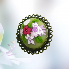 Broche rétro ovale fleurs rose mauve