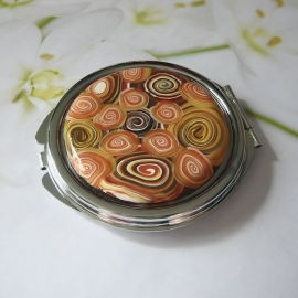 Miroir de sac rond spirale orange marron